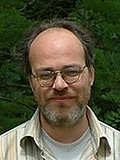 Dr. Jörg Adam Becker